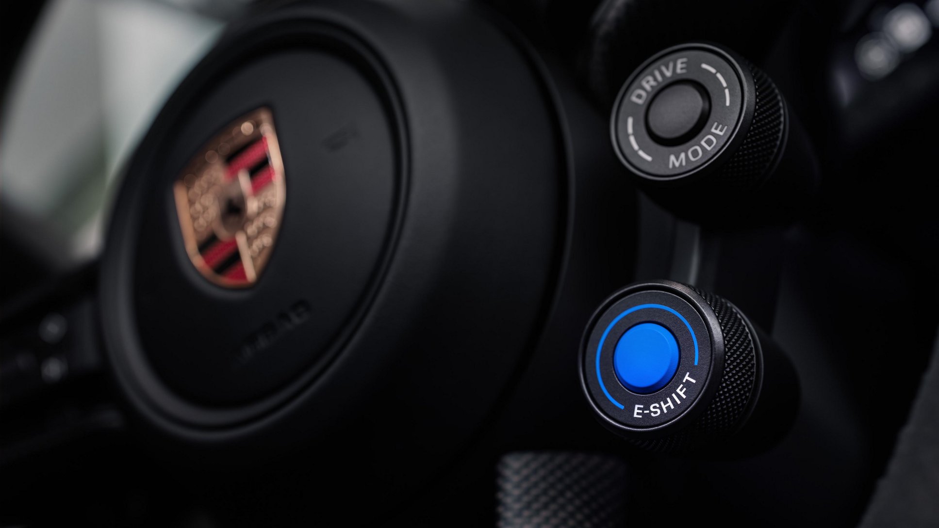 Porsche Taycan Turbo GT with the E-Shift mode switch on its GT-sports steering wheel